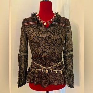 Elie Tahari top + chain belt